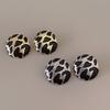Korean-French Chic Leopard Print Round Earrings: Women's Fashion Studs with Unique Design and Simple Pattern.