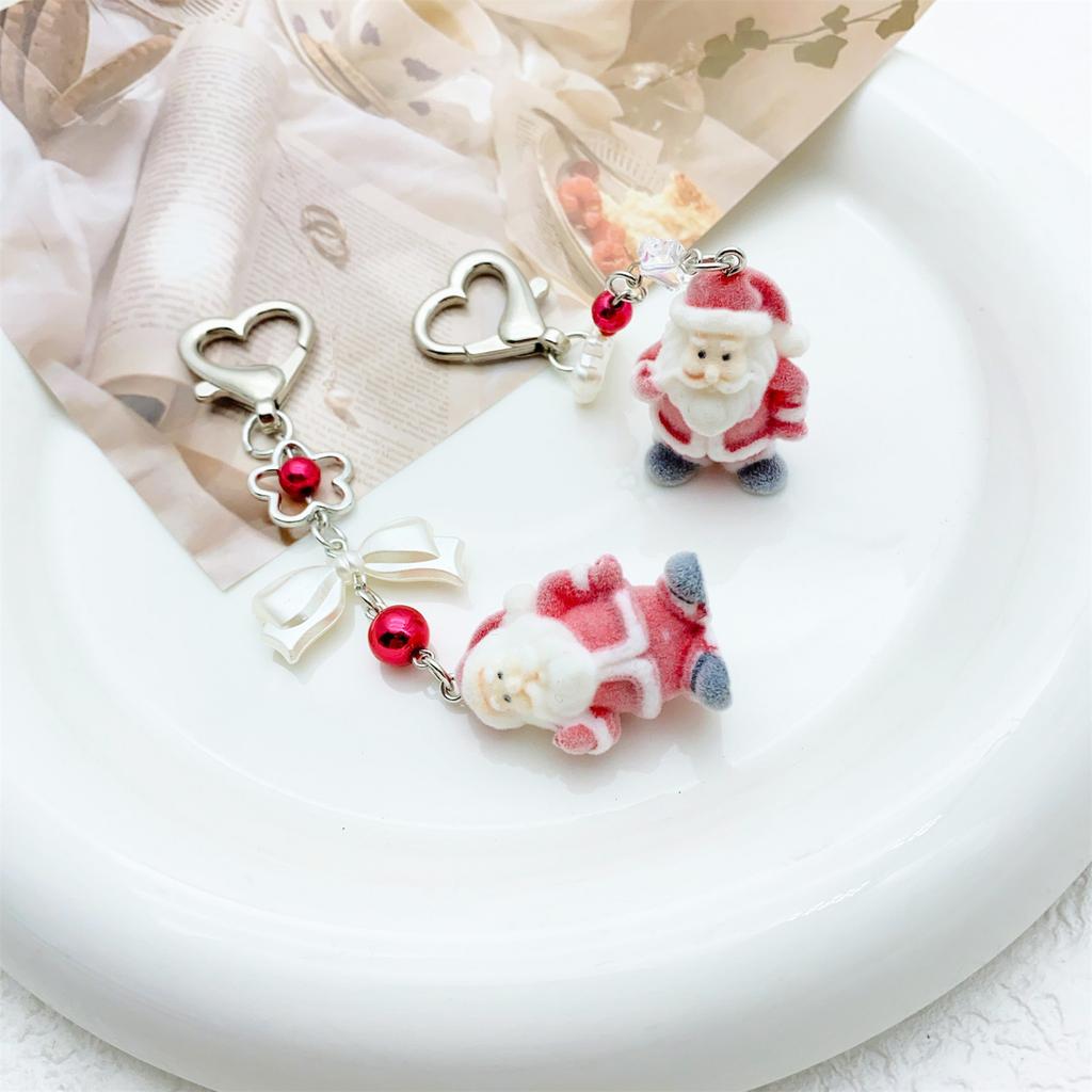Fashionable Christmas Santa Claus Flocking Keychain With Star Bowknot Soft Plush Charm Accessory for Bags and Phones