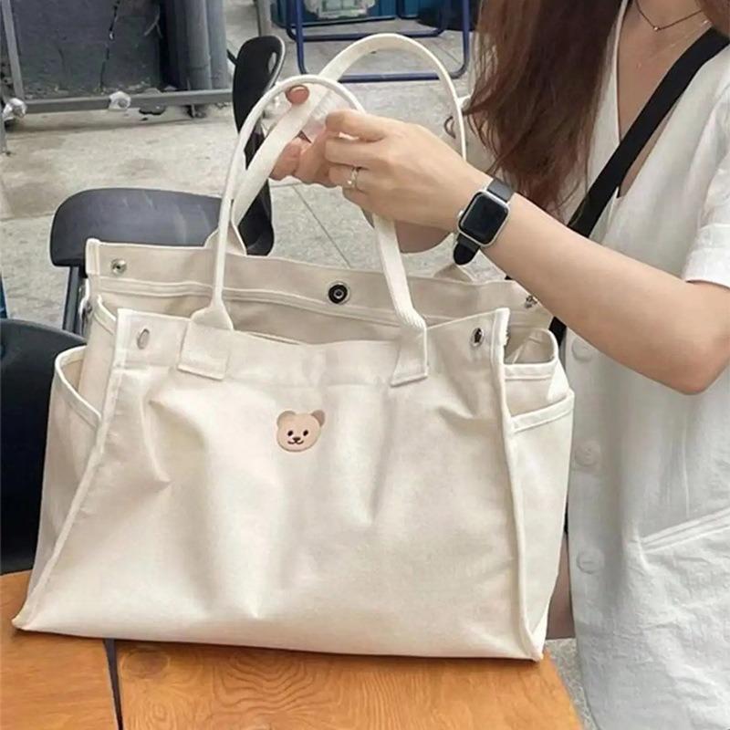 

Mummy Bag Large Capacity Outgoing Lightweight Handheld Shoulder Bag Fashionable Multifunctional Canvas Mother Baby Bag білий