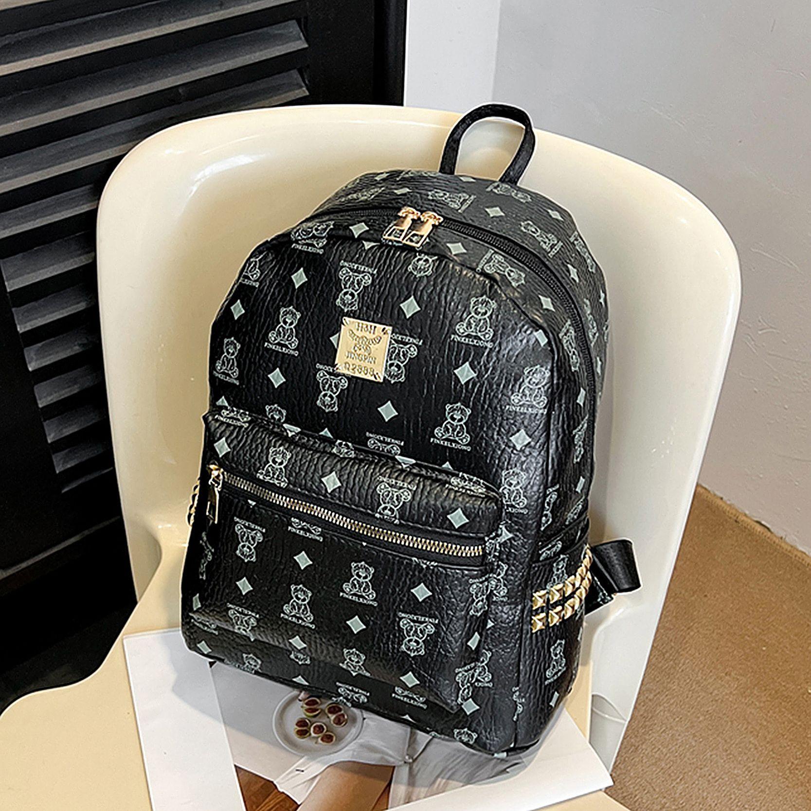 

Рюкзак с высококачественным принтом, простой школьный рюкзак с мультяшным принтом, женский новинка 2025 года, вместительный текстурированный рюкзак для книг чёрный