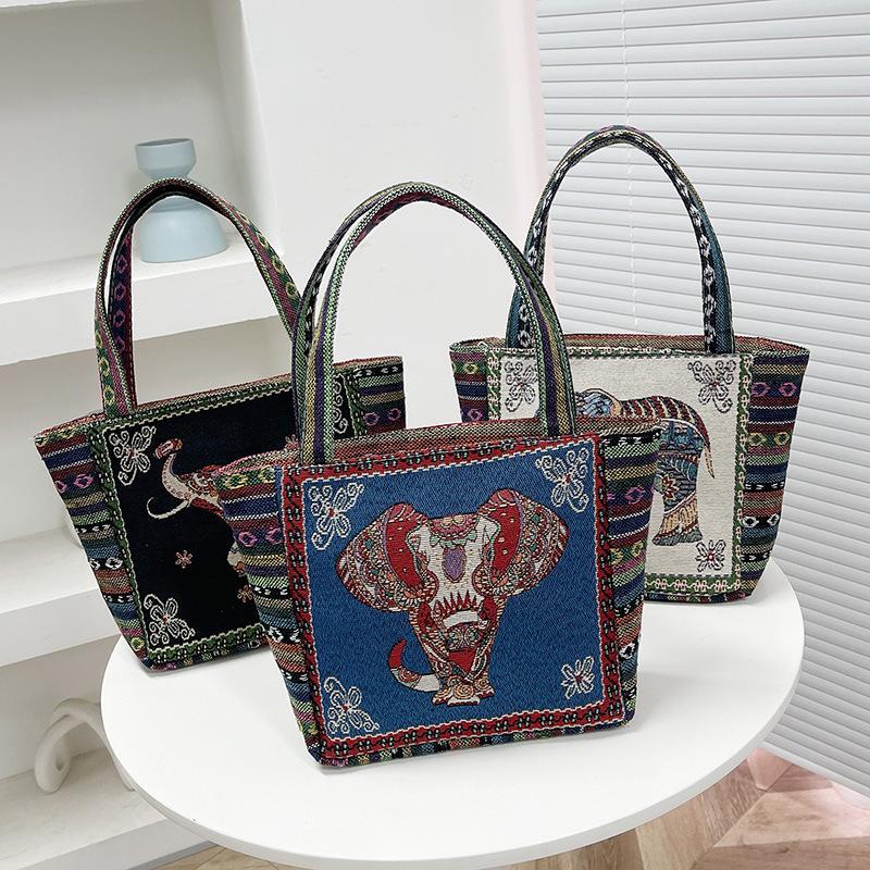 The Elephant Embroidery Double-sided Hand Shoulder Bag Is Versatile with Jacquard Patterns