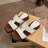 Retro versatile one-word slippers women's 2025 summer new outer wear retro flat bottom heightening sandals simple sandals tide