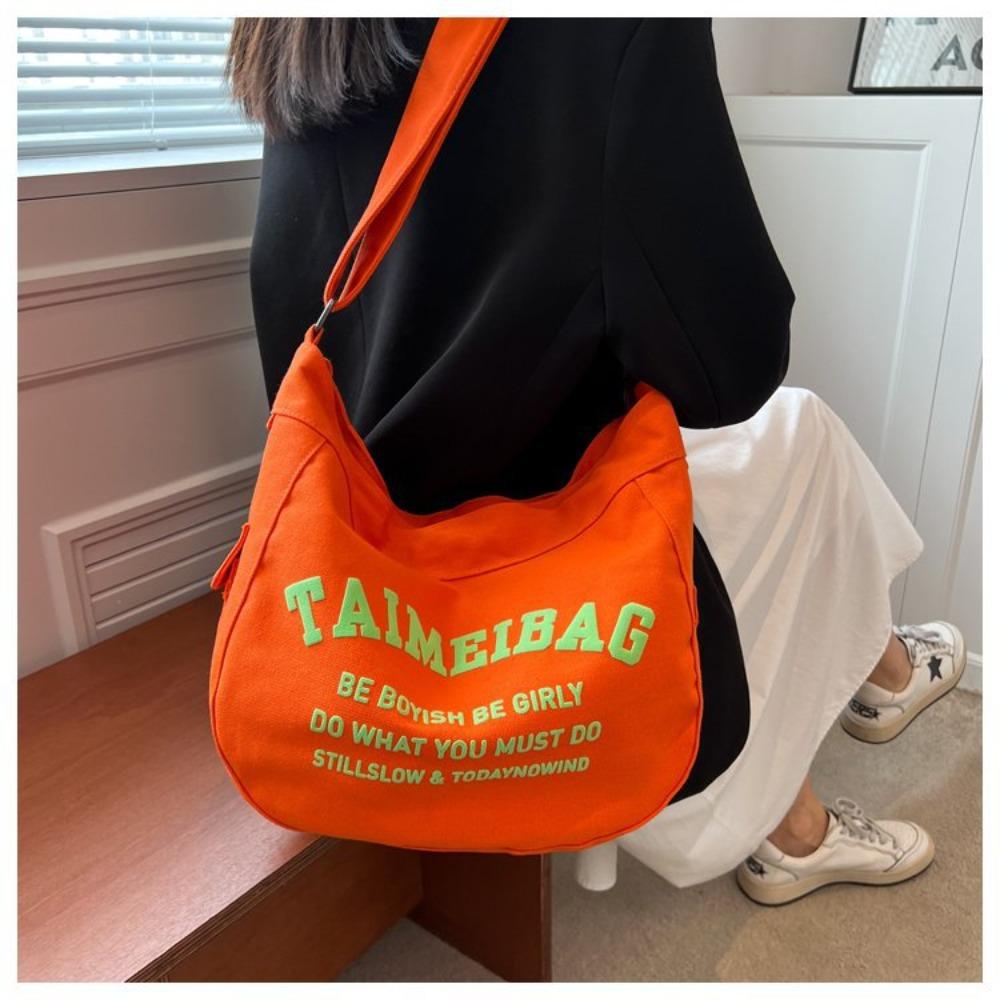 

Large capacity canvas bag 2025 new shoulder bag women s tide lazy style travel bag student messenger bag commuter bag see picture помаранчевий