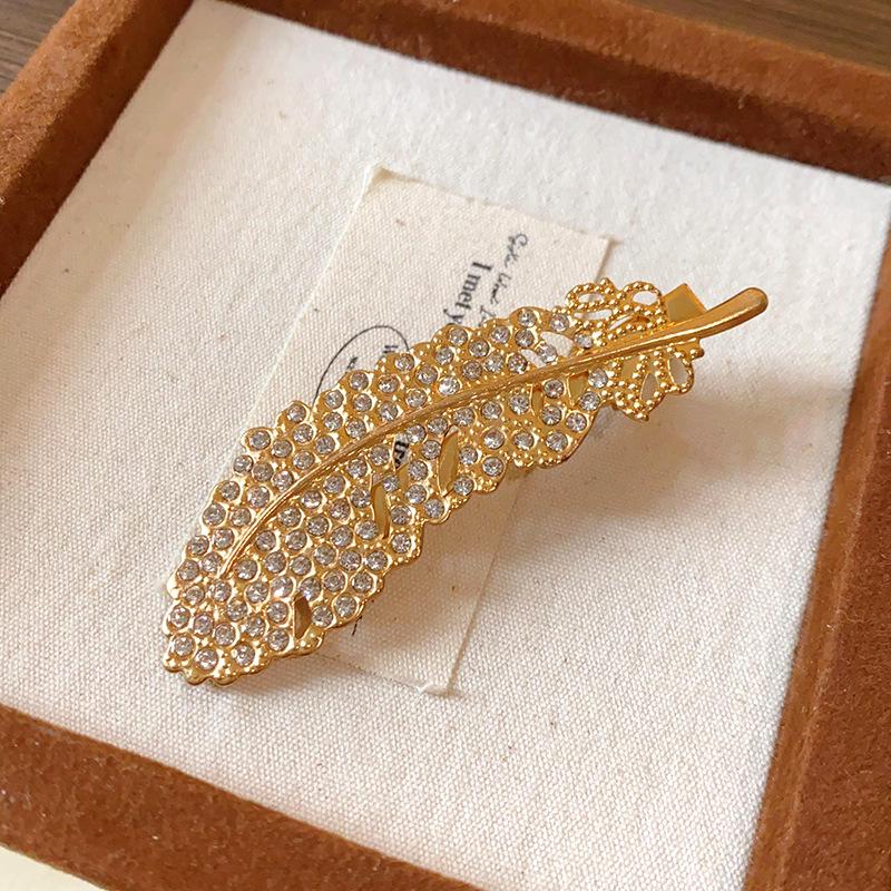 

Korean Style Rhinestone Feather Hair Clip - Luxury Duckbill Hairpin Accessory
