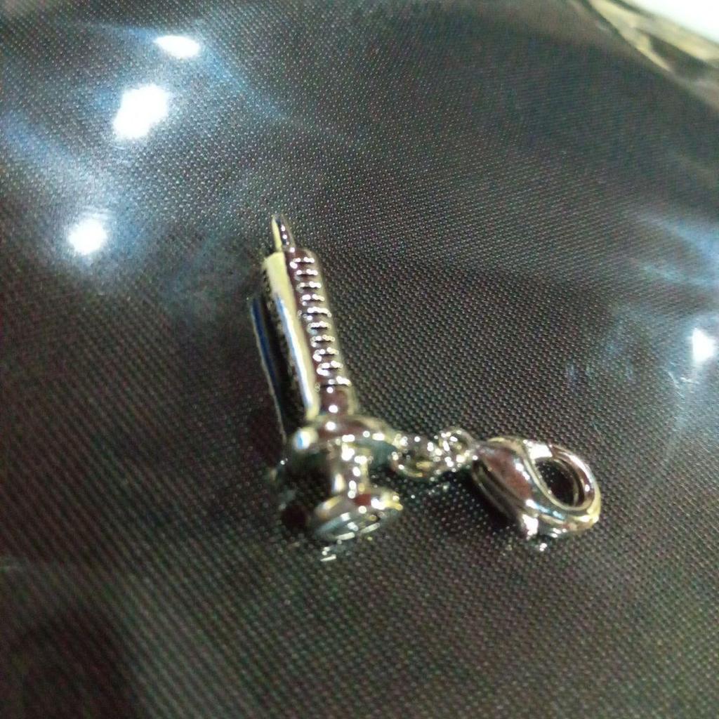 Used Q-pot Syringe-shaped silver charm approx. 2.3cm