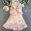 French niche gentle wind temperament V-neck dress women's autumn and winter design waist thin big swing ruffle edge dress