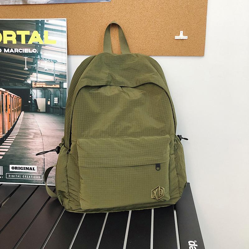 School bag Korean version ins high value backpack early high birth girl casual simple commute versatile large capacity