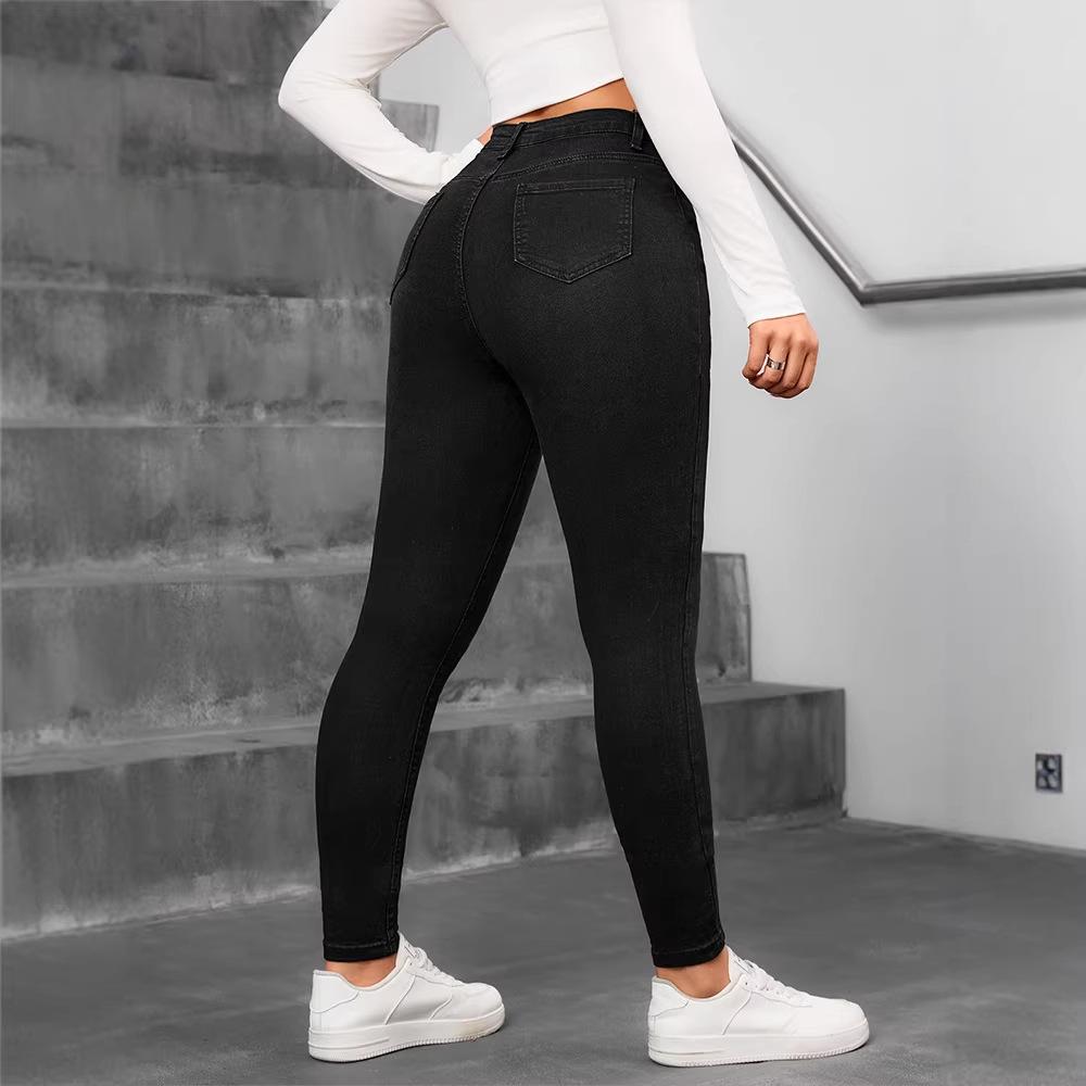Jeans Skinny da Donna: Jeans neri elasticizzati, a vita alta, che snelliscono la pancia
