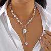 Stacked pearl necklace collection European and American retro baroque special-shaped pearl OT buckle blade snake chain tassel