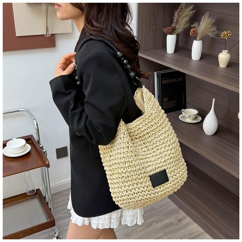 Taschen Damen Retro geflochtene Taschen Fauler Stil große Kapazität ausgehöhlte Strandtaschen Kontrastfarbe Unterarm-Beuteltaschen