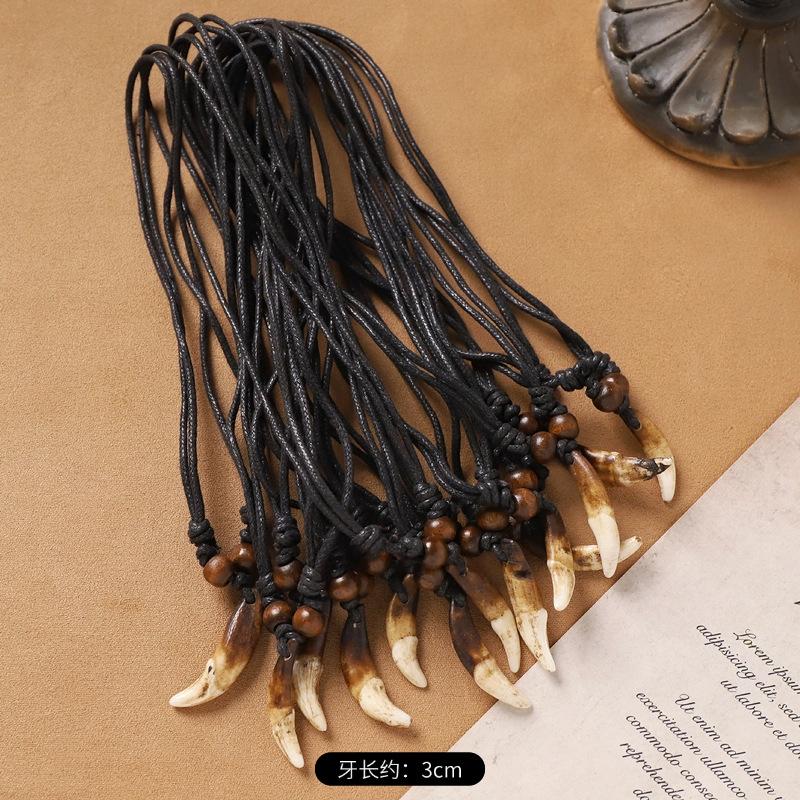 

Natural dog tooth pendant Tibetan retro niche men s and women s collarbone chain pig tooth sweater chain wolf tooth necklace