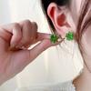 The New Fashion Four-leaf Clover Cat's Eye Stone Earrings Small Exquisite Earrings Temperament