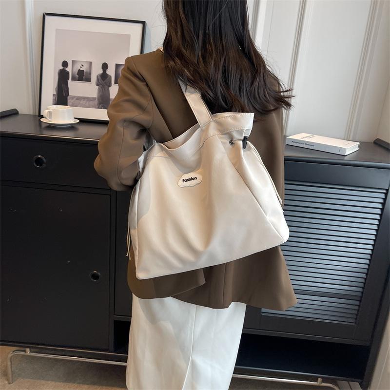 Large capacity women's canvas bag, new simple literary work commuter shoulder bag fashion trend shoulder messenger bag