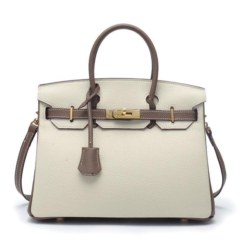 2021 Spring new trendy leather handbag top layer cowhide capacity one-shoulder crossbody hand-carried platinum bag