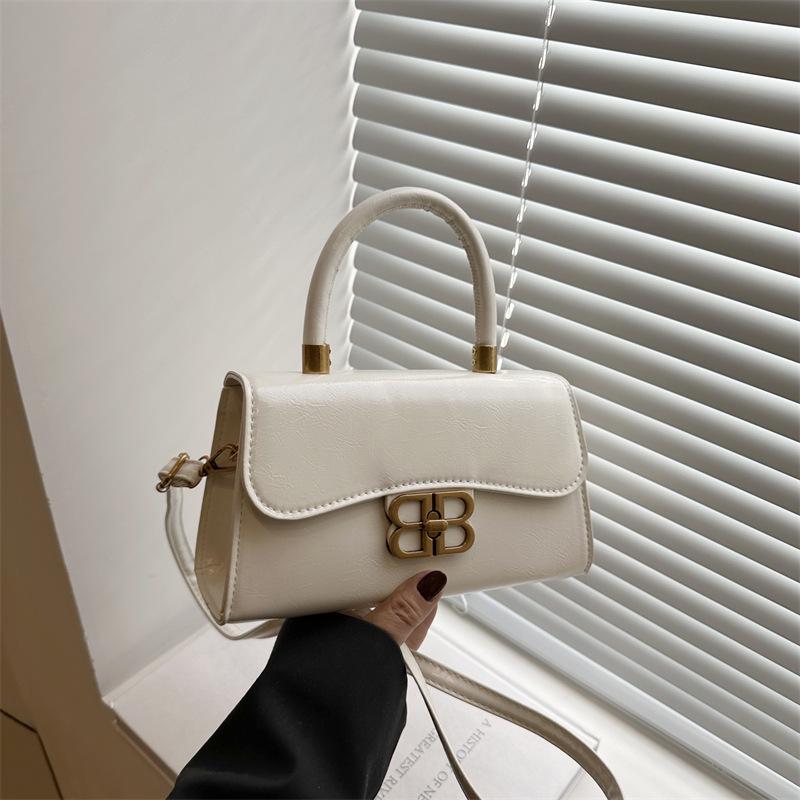 Summer new retro solid color fashion hand carry small square bag women's premium messenger bag texture niche shoulder bag