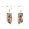 New Retro Leather Pattern Fashion Personality Camouflage Leopard Print Symmetrical Women's Earrings Wholesale