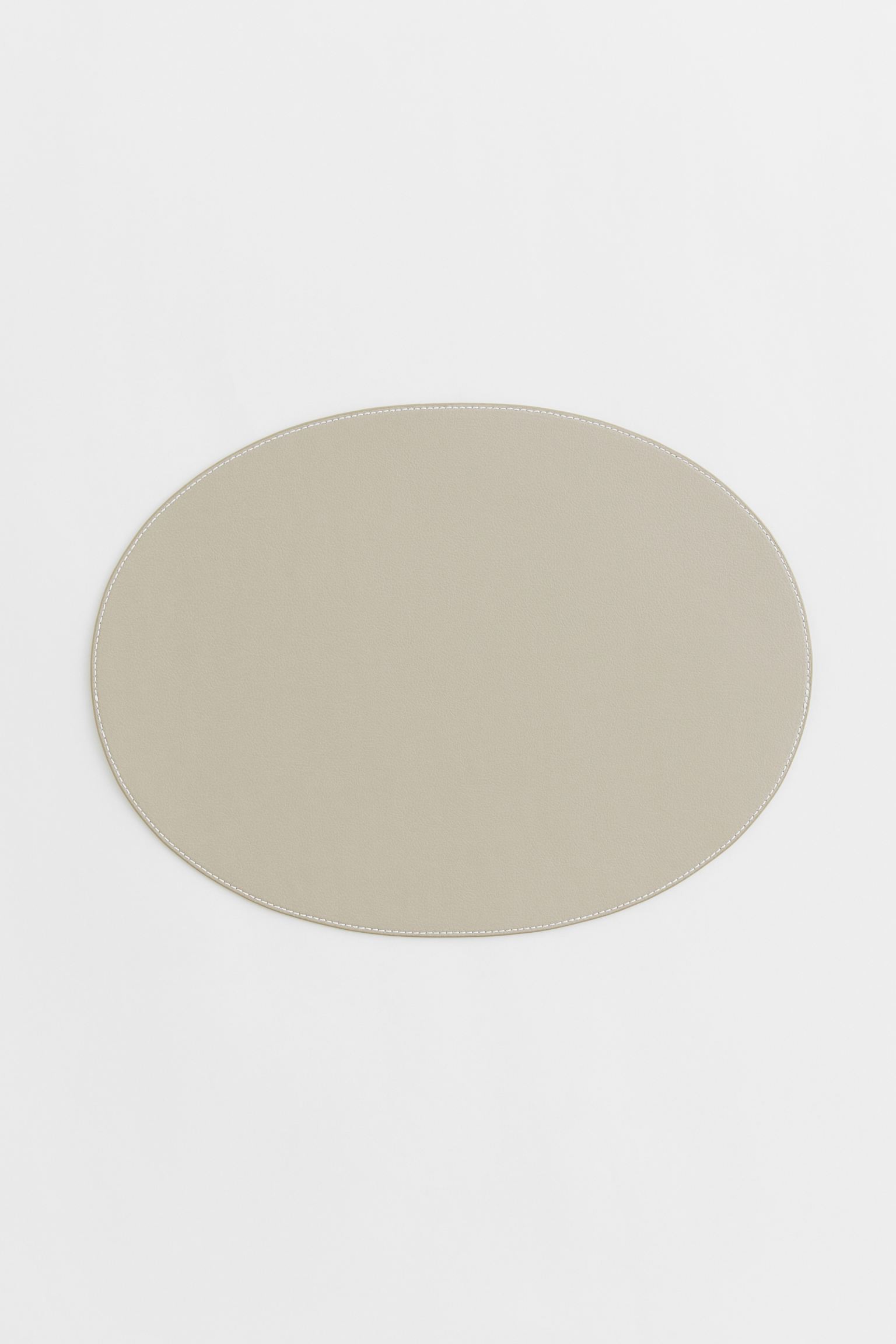 

Oval table mat