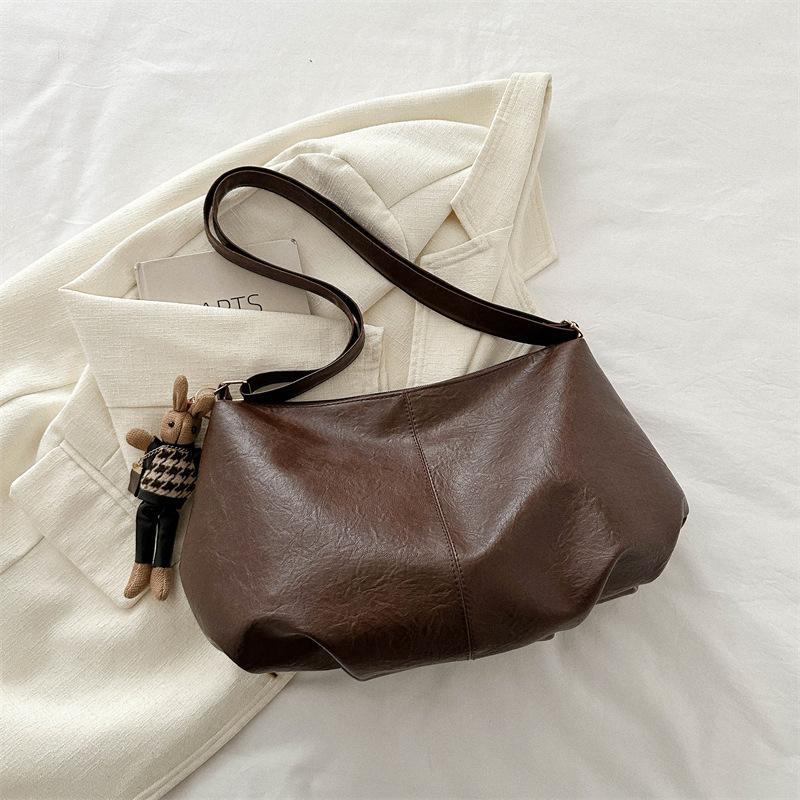 Soft leather large-capacity Korean version retro shoulder messenger bag 2025 early spring new versatile ins commuter tote bag tide