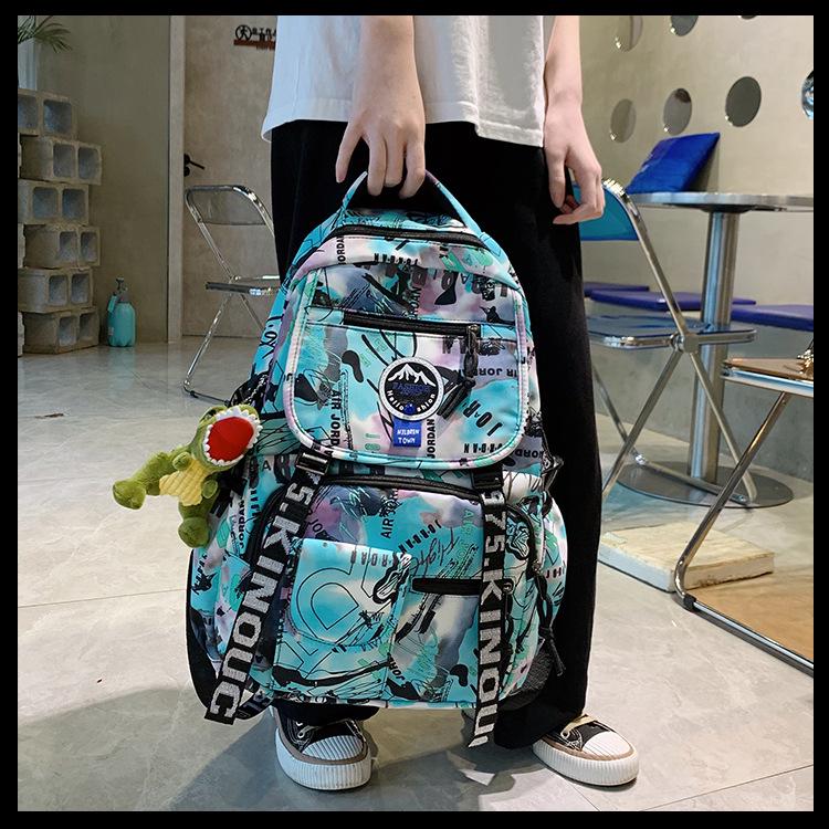 Spot Graffiti Streetwear Lightweight Backpack for Students & Casual Use