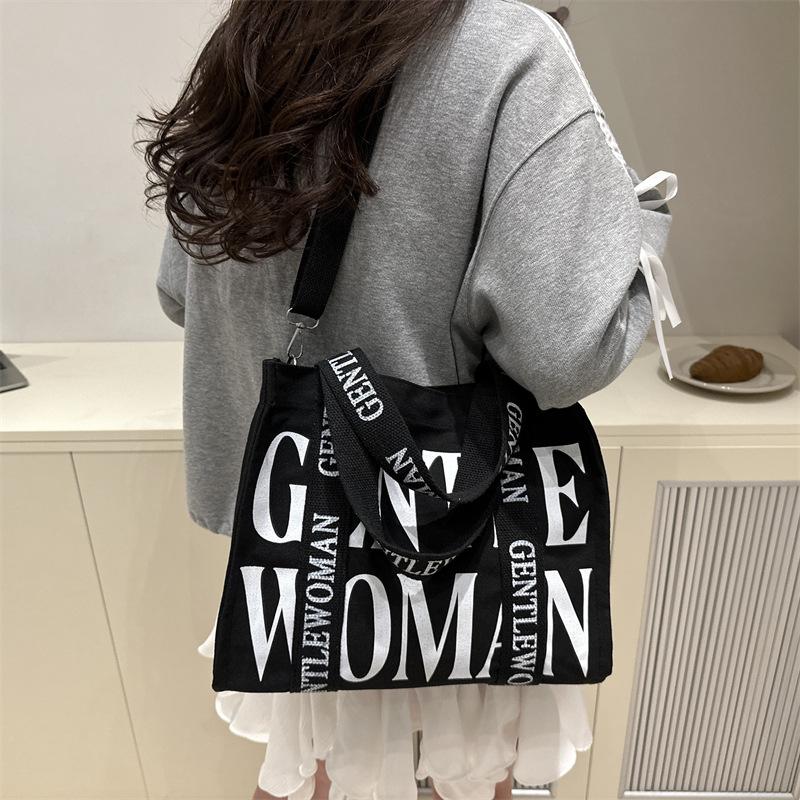 2025 Women's Color-Blocking Canvas Handbag: Trendy Crossbody & Shoulder Bag with Colorful Strap