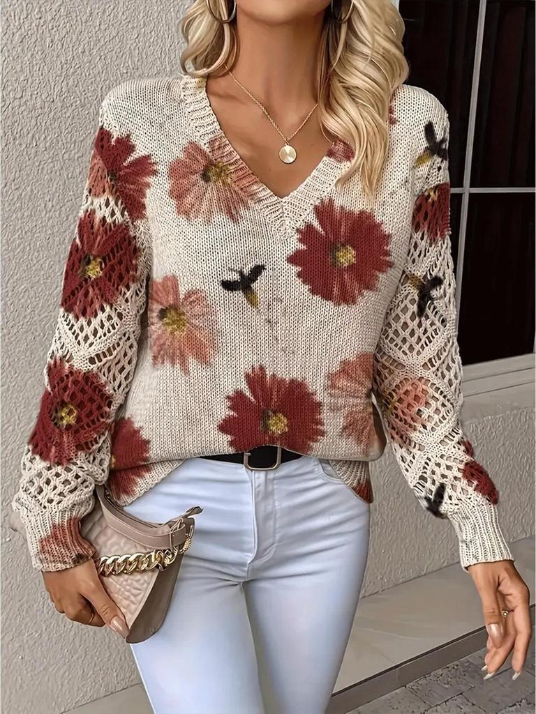 Women's Off-White V-Neck Knit Sweater with Blue Floral Pattern and Lace-Up Sleeve Detail
