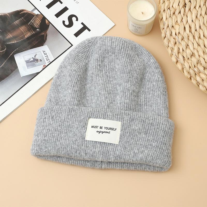 Autumn and winter hats Women's wool hats Big head circumference shows small face Baotou hat Fleece ear protectors Warm knitted hat