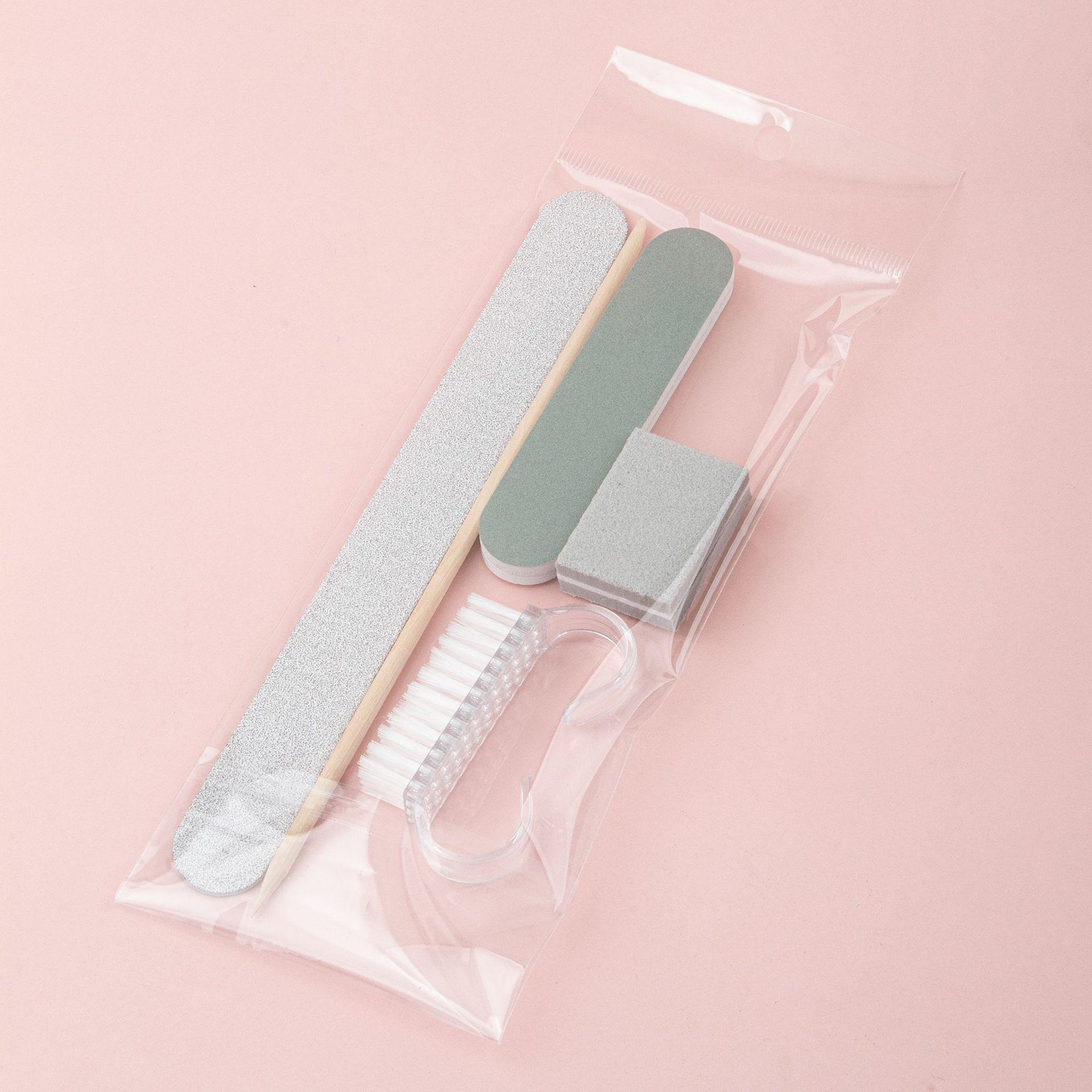 

Набор для маникюра из 5 предметов: Пилка для ногтей, средство для удаления кутикулы, очиститель межпальцевых промежутков, полировщик — идеальный дорожный или гостиничный подарок. серый