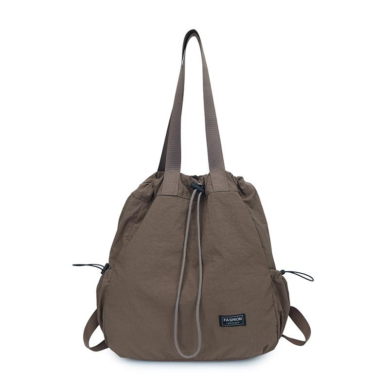 Schoolbag Large Capacity Drawstring Backpack Women's 1011 New Travel Outdoor Handheld Shoulder Bag Lazy Wind Tote Bag