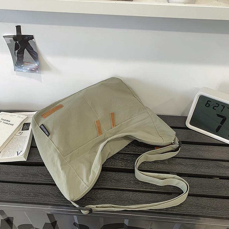 

Crossbody bag male ISN trendy brand large-capacity messenger bag female simple and lightweight shoulder bag college student class bag зелений