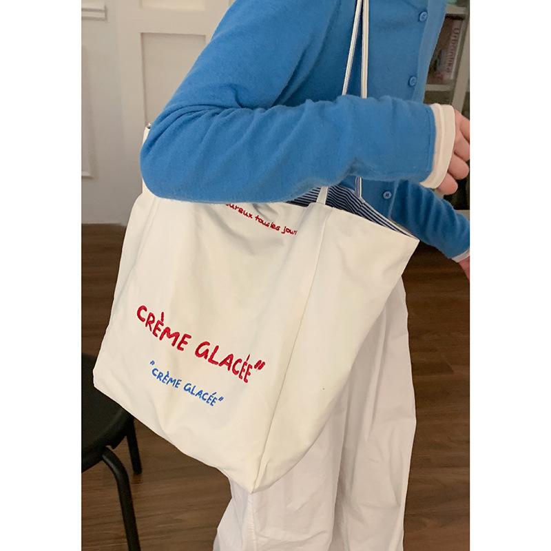

Korean literary and artistic letter printed canvas bag for women 2025 new large-capacity shoulder tote bag shopping bag