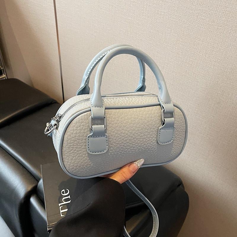 Niche Portable Bowling Bag Women's 2025 Summer New Fashion Texture Shell Bag Versatile Shoulder Messenger Bag