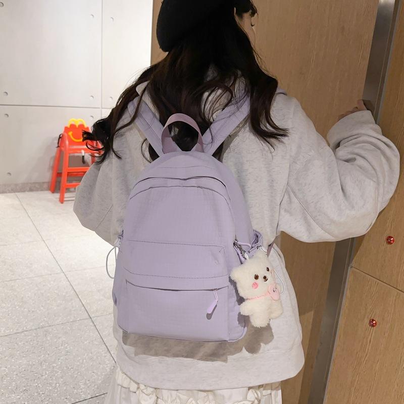 Schoolbag high-value backpack women's 1011 new casual simple large-capacity junior high school backpack commuting class schoolbag
