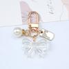 Elegantní perlová mašlička Přívěšek na klíče s mašličkou Ženy Dívky Přívěsky na klíče Přívěsky do auta Držák na klíče Kabelka Příslušenství Diy Šperky Dárky