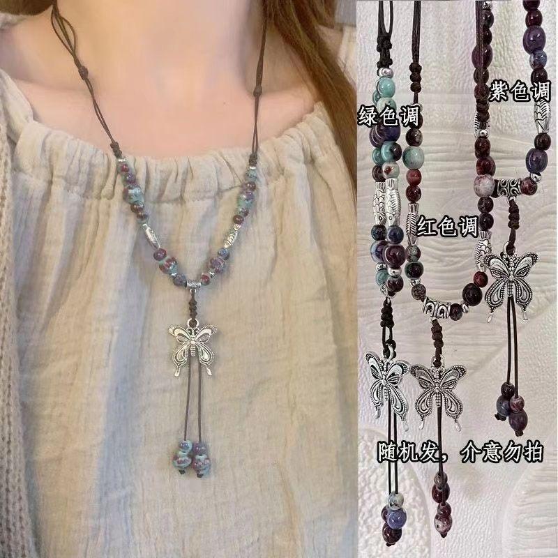 Ceramic butterfly rose woven necklace women's new retro accessories can be drawn long graduation gift