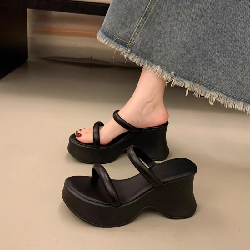 Temperament advanced sense one-word slippers women's summer wear new small thick-bottomed wedge heel high-heeled muffin slippers