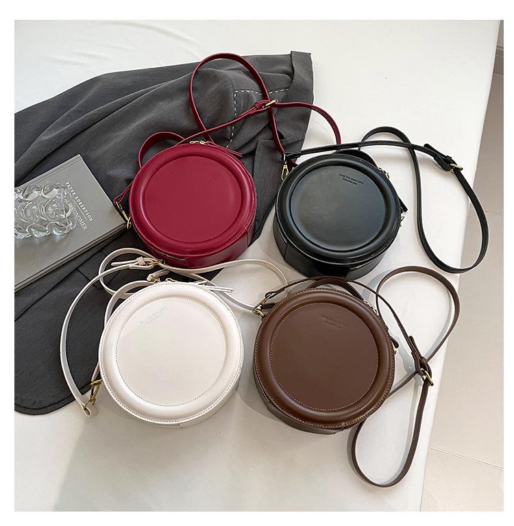 Niche Retro Hong Kong Style Women's Round Handbag - 2025 Early Spring Fashion, Versatile Single Shoulder Crossbody Bag