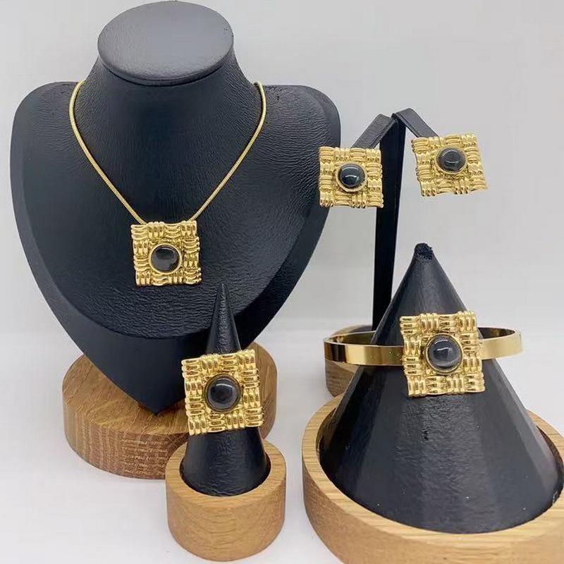 Personalized Natural Stone Pearl & Gold Snake Bone Chain Jewelry Set - Light Luxury Titanium Steel, 4-Piece Collection.