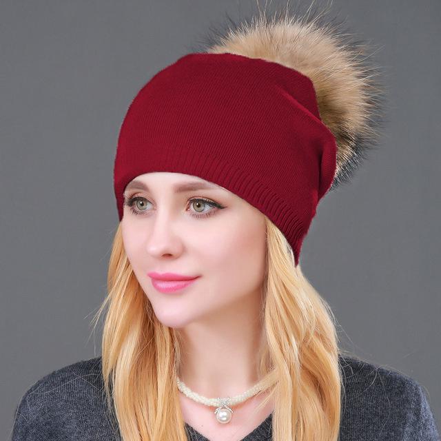 

Autumn & Winter Women s Knitted Wool Hat with Raccoon Fur Pom-Pom - Stylish, Warm, Pullover Design.