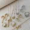 CARLIDANA Fashion Gold Plated Stainless Steel Large Bowknot Pendant Tassel Snake Chain Necklace Stud Earrings Jewelry Set Women