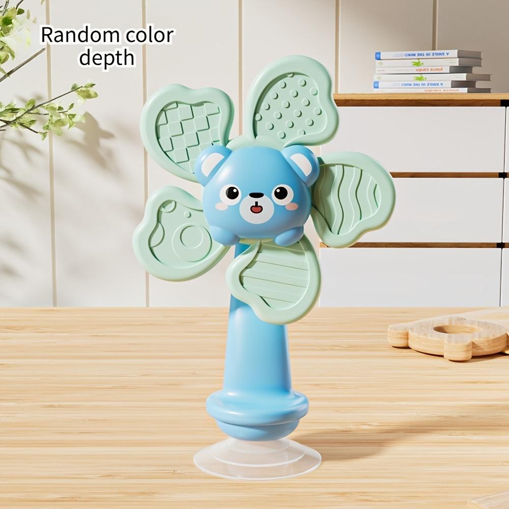 Baby Suction Cup Spinner, ABS sensory toy, portable for travel, helps develop motor and cognitive skills.