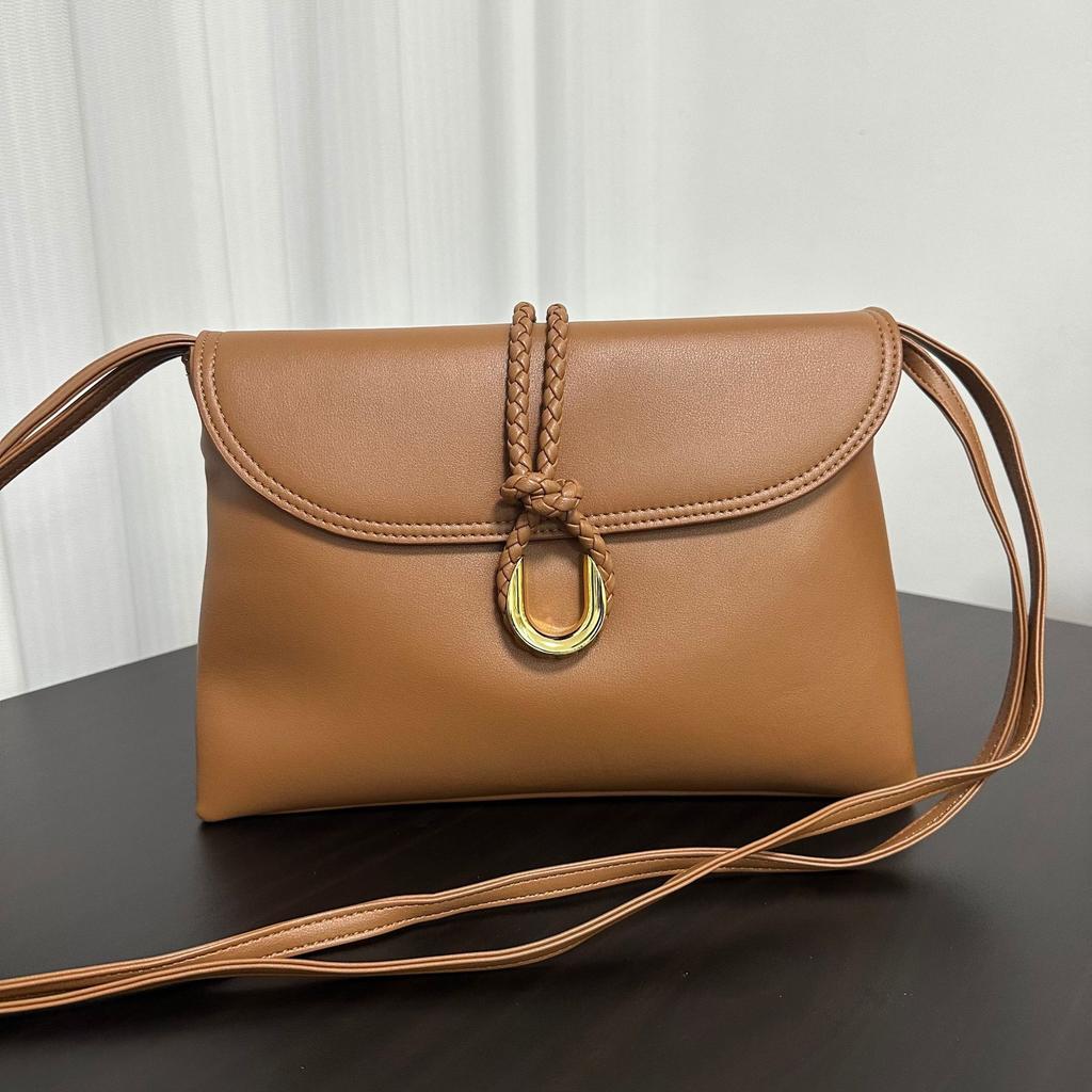 Borsa busta transfrontaliera in nuova pelle di mucca, borsa in vera pelle, pochette testurizzata Liberta borsa a tracolla messenger tessuta per pendolari