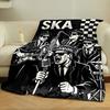 Black-and-white ska-themed band illustration with checkered patterns. for all seasons blanket lunch break throw gift