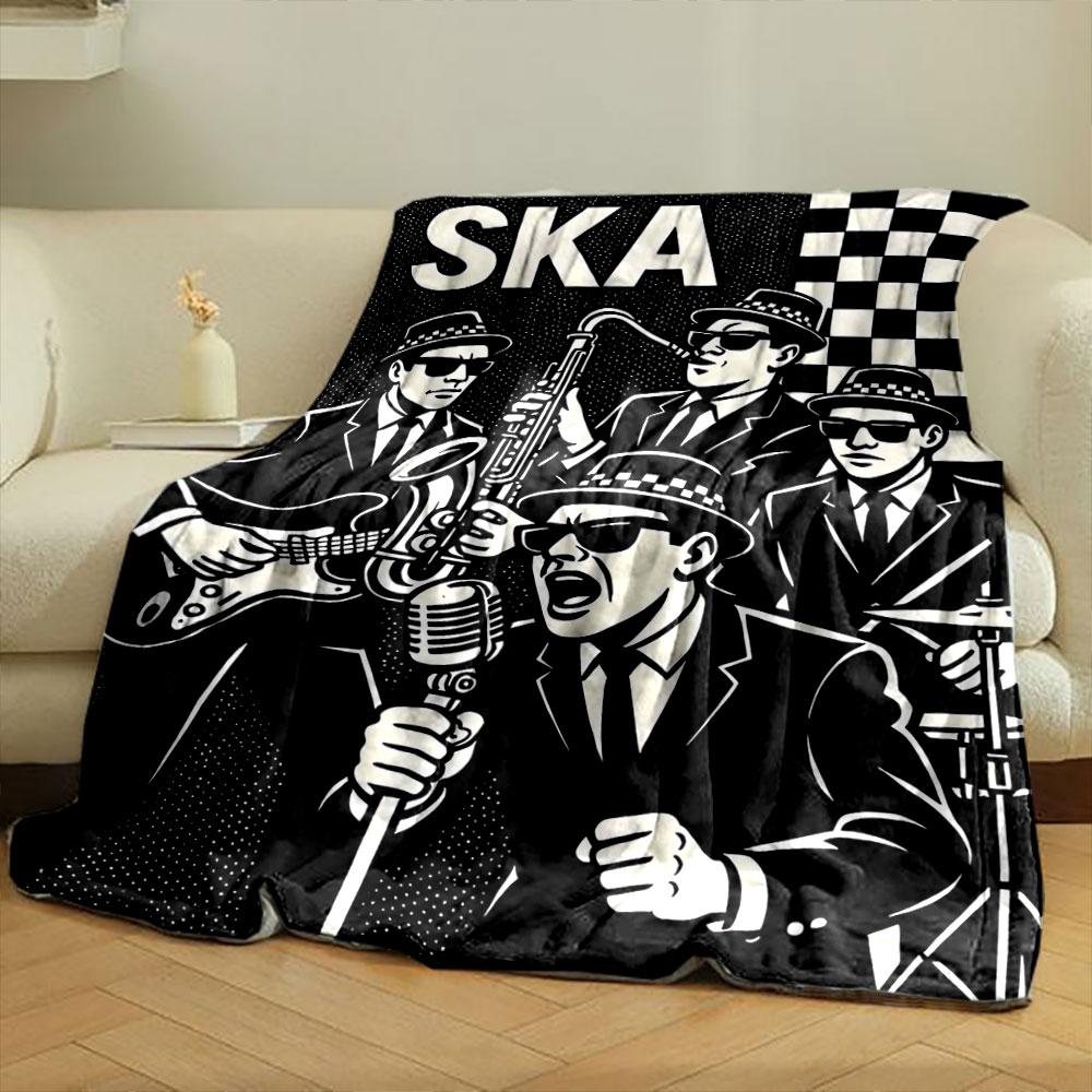Black-and-white ska-themed band illustration with checkered patterns. for all seasons blanket lunch break throw gift