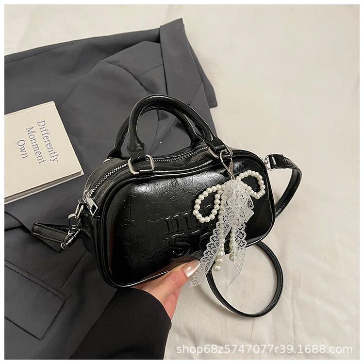 High-end niche bag women's 2025 new PU soft-faced shoulder messenger bag large-capacity trendy portable Boston bag