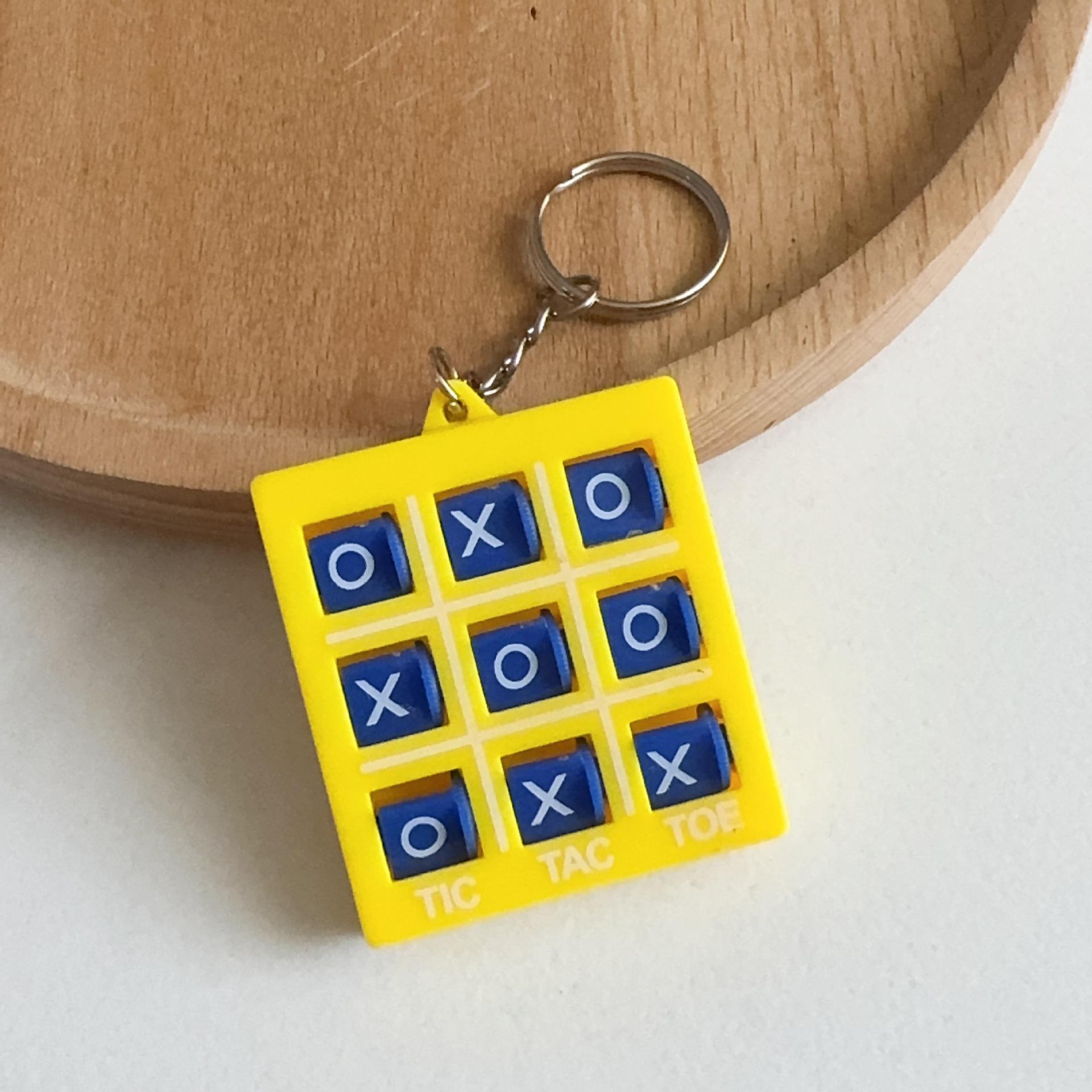 

Мини брелок Крестики-нолики XO: Кулон-пазл для двух игроков для детей
