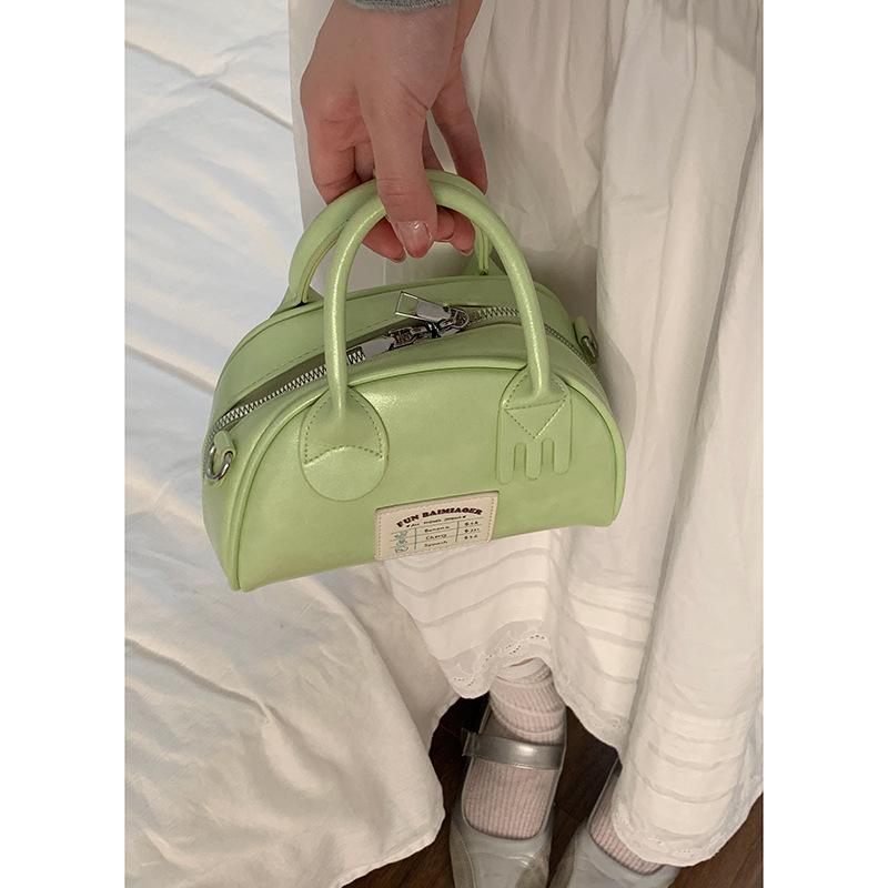 

Summer simple small fresh portable bowling bag women s 2025 new versatile shoulder messenger small square bag зелёный