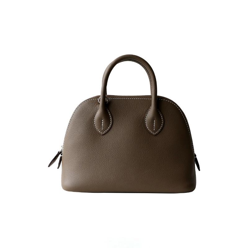 First layer cowhide handheld women s bag, high-end niche design, shell bag, simple mini bowling bag, urban simplicity 18*9*15CM