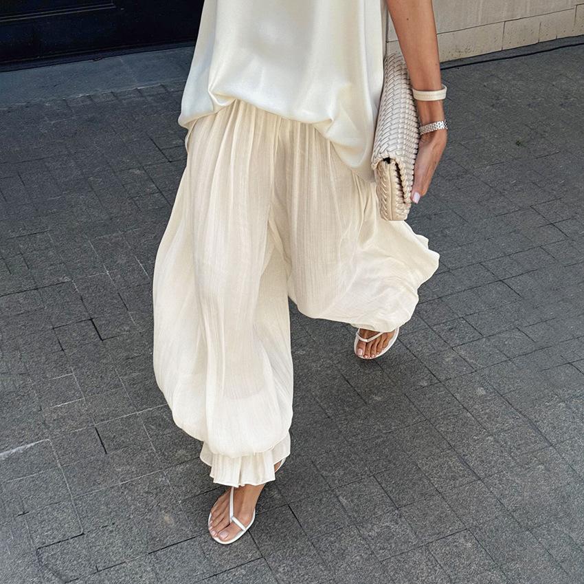White Wide Leg Pants with Pleated Detail and Ruffle Hem
