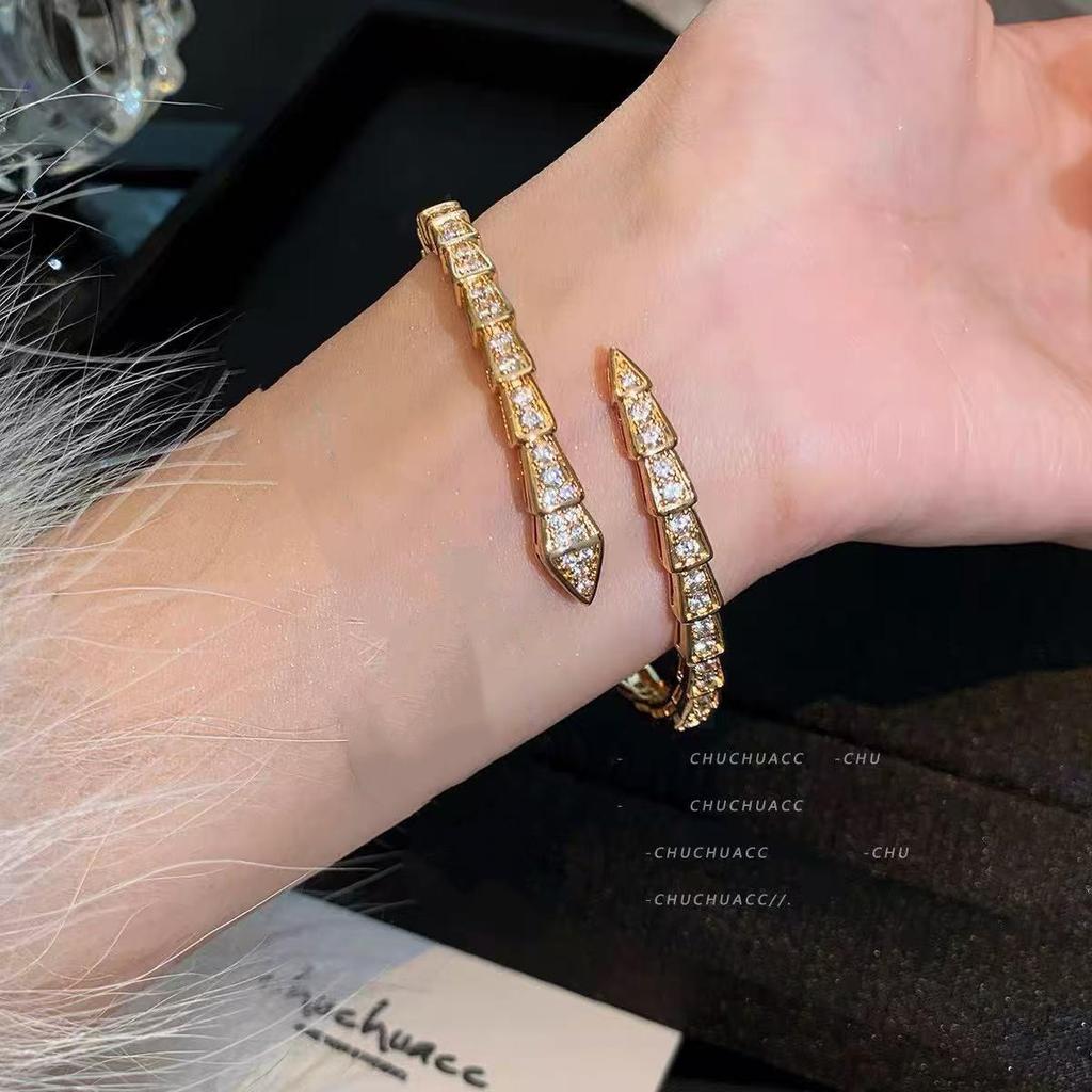 Vielseitiges schlangenförmiges Sternenhimmel-Diamantarmband – High-End-Mode, europäischer und amerikanischer Stil.