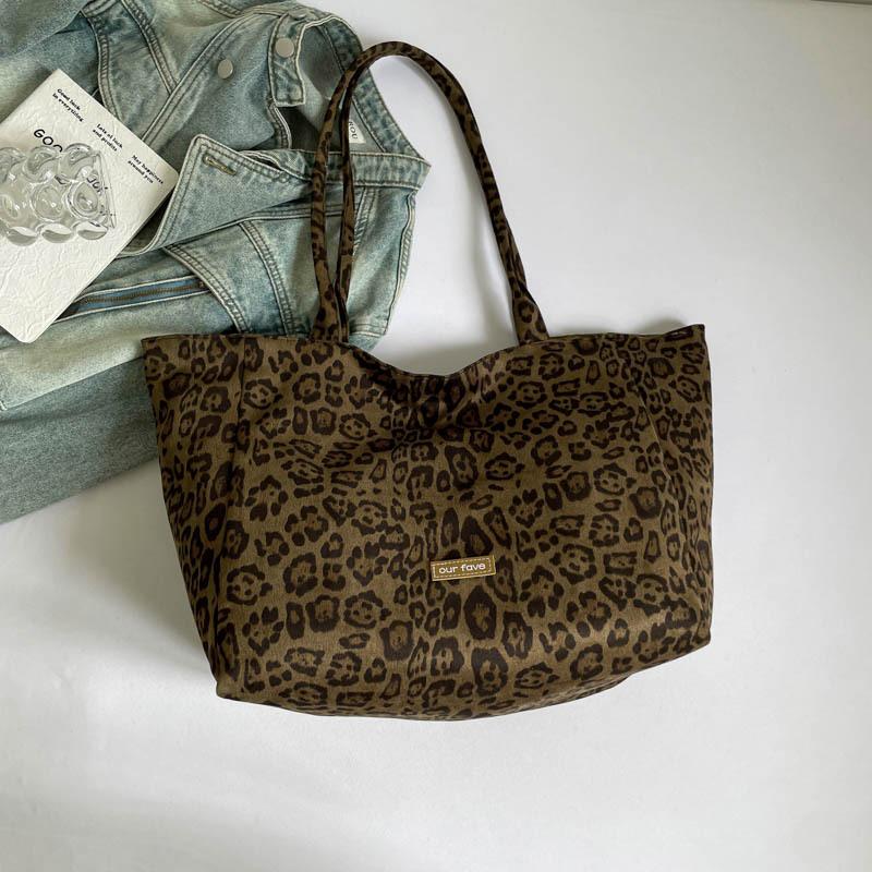 

Leopard print canvas commuting lazy wind bag women 2025 casual fashion portable large capacity shoulder simple bag crossbody